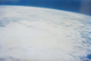 Earth and sky views taken astronaut Scott Carpenter